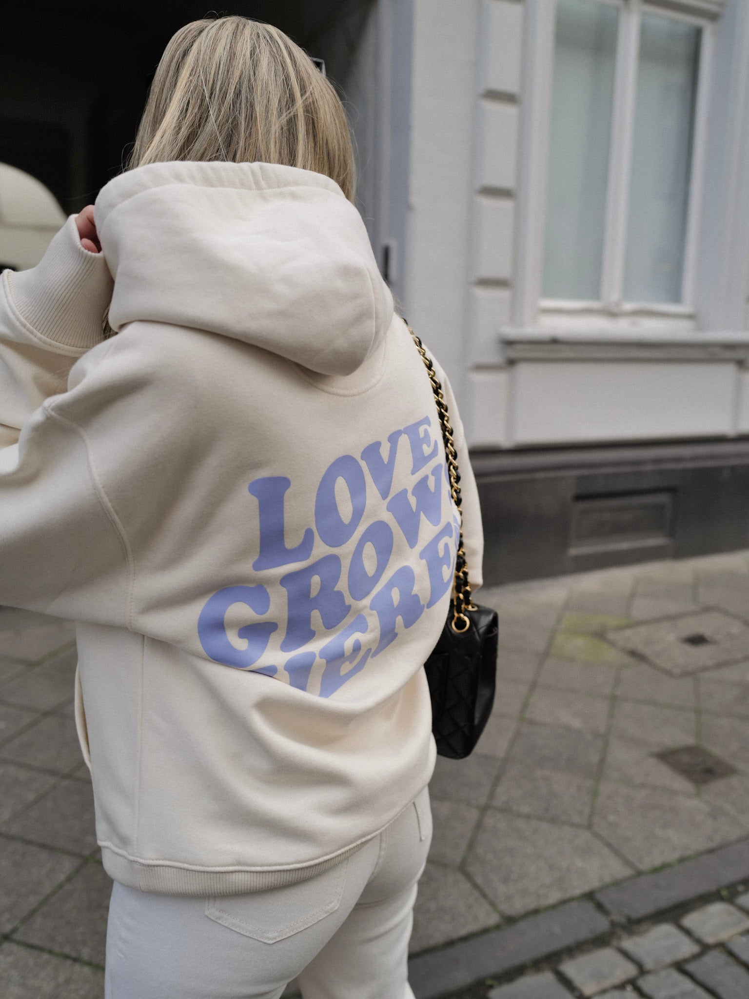 LOVE GROWS HERE Hoodie - FAMVIBES